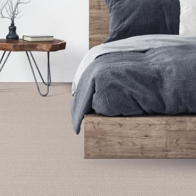 textured beige carpets in a rustic bedroom